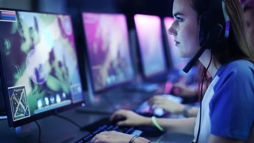 Girl Gamers Playing Video Games Competitively Together