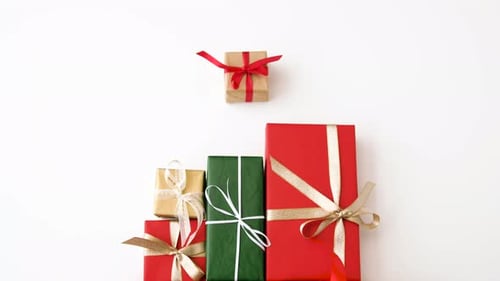 Festive Stack of Colorful Christmas Presents with Ribbons