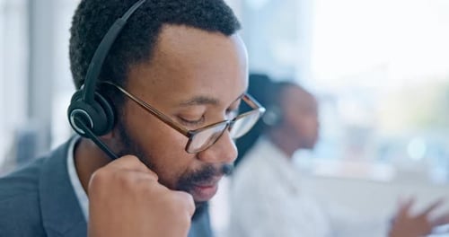 Face, customer service and a black man consultant working in a call center for support