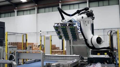 Automated Robotic Arm Works in Modern Factory