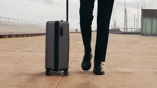 Tourist Man with Suitcase Baggage in Spain A Traveler with Luggage Suit Jacket on Business Street Go