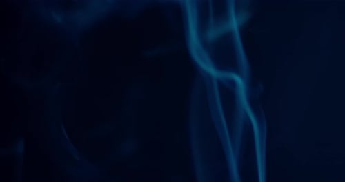 Colorful smoke on dark background