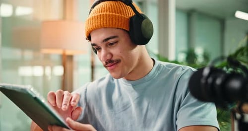 Radio host, tablet and man in studio, internet and message to contact, subscription