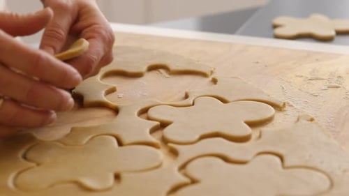 Cutting Out Gingerbread Men Cookies Baking