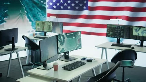Tech Office with Computers and American Flag