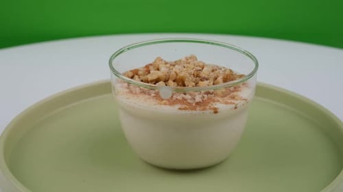 Desert with Custard and Crushed Nuts