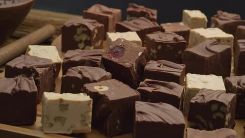 Variety of Handmade Chocolate Fudge on Wooden Tray