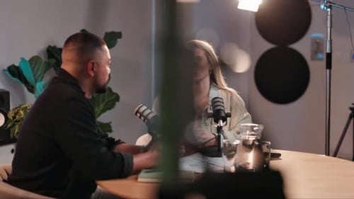 Podcast, presenter and people with mic for broadcast, conversation and talking for interview