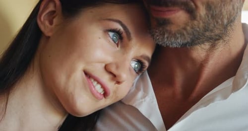 Loving Couple Embracing Tenderly in Home