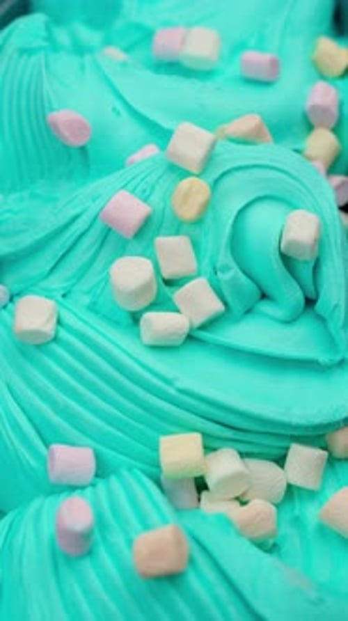 Ice Cream with Light Marshmallows in Iron Container