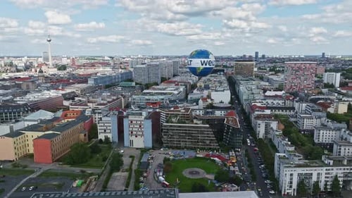 Aerial view revealing The Berlin Weltballon in Berlin city centre on a sunny day