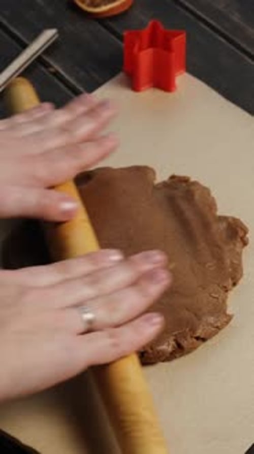 Preparing Dough for Festive Cookies on Wooden Table