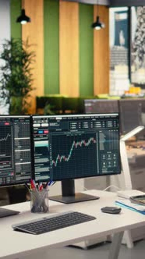 Vertical Video Trading Platform on Screens Used By Financial Professional Tracking Stock Market