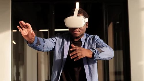 Man Experiencing Virtual Reality with VR Headset