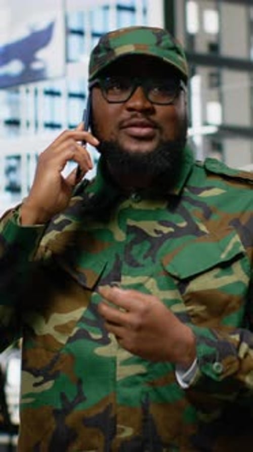 Vertical Video Black Soldier in Uniform Answering Phone Call From His Superior