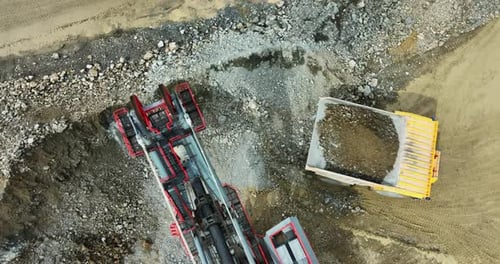 Aerial View of Rock Crusher and Dump Truck