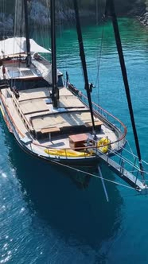 Aerial shot of wooden gulet on ocean