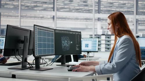 Women Working in Microchip Factory Lab Training AI Assistant
