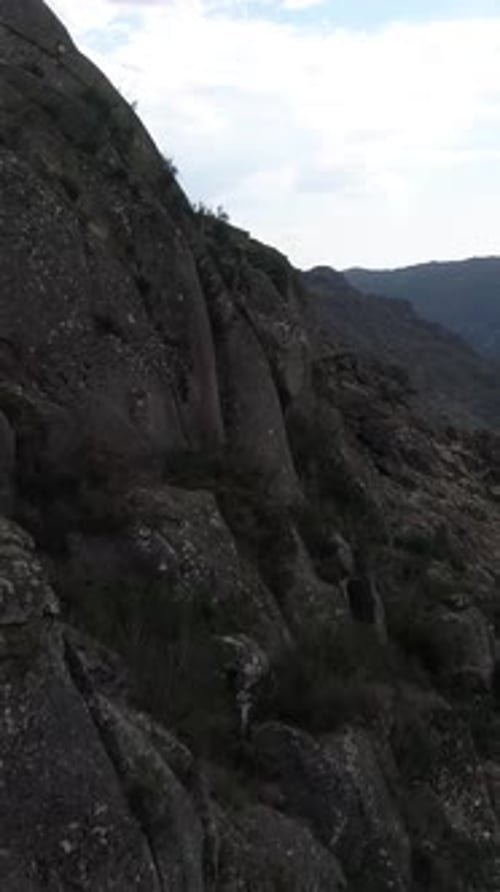 Vertical Video of High Mountains Rocks Formation Aerial View