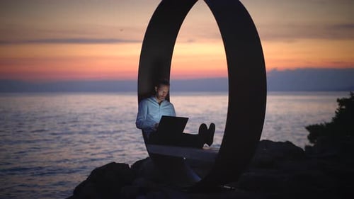 Experience a Serene Workspace By the Ocean Perfectly Framed at Sunset for Relaxation