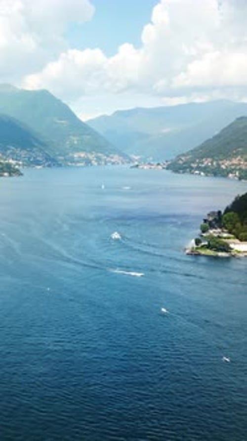 Aerial, drone view of Como, Italy on the shore of Lake Como. Vertical
