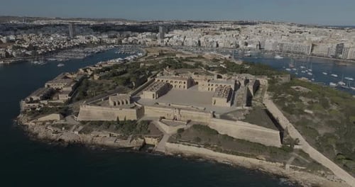 Aerial view of historic fort by Mediterranean Sea, Valletta, Malta.