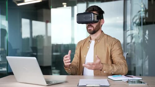 Man Wearing VR Headset Interacting in Virtual Reality