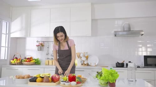 Woman With Tablet Prepares Healthy Meal