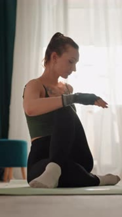 Homebased Routine Focusing on Posture and Flexibility Improvement Sunlit Living Room Where Woman