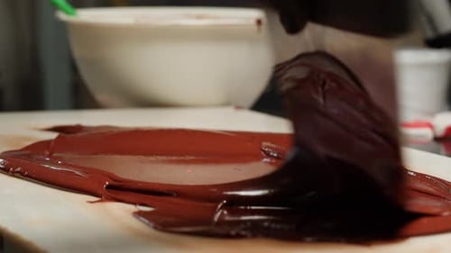 Melting Red Chocolate for Dessert Preparation