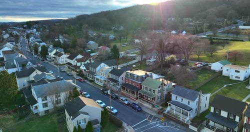 Quaint colorful American homes in USA small town. Beautiful establishing shot aerial of homes and ho