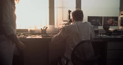 Scientists Analyzing Dinosaur Fossils in Laboratory