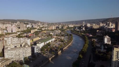 Drone Shot of Tbilisi SovietEra Buildings and River View