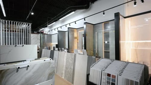 Element of Modern Tile Showroom Interior with Large Ceramic and Porcelain Slabs Displayed in