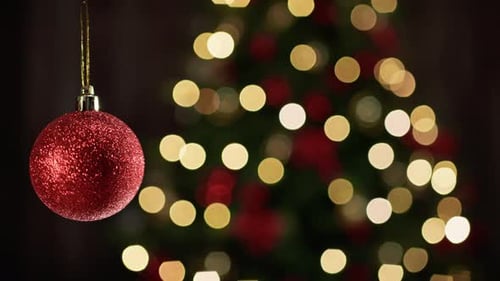 Festive Red Ornament and Christmas Tree Lights