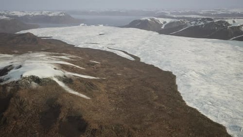 Snowcovered Mountain Range Seen From Above