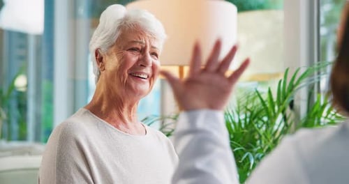 Healthcare, doctor and old woman in office, funny and support with recovery, laughing or cure