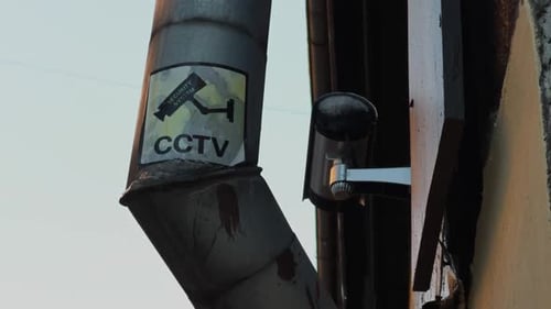 Urban Surveillance A CCTV Camera Strategically Mounted on a Building to Enhance City Safety and