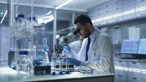 Scientists Conducting Medical Research in Modern Laboratory