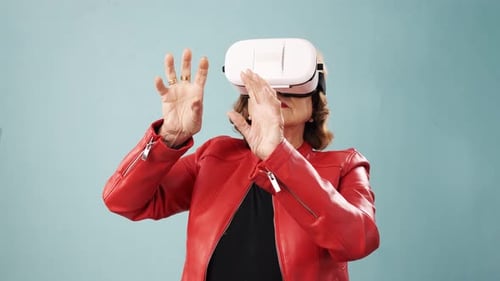 Senior Woman Experiencing Virtual Reality Headset