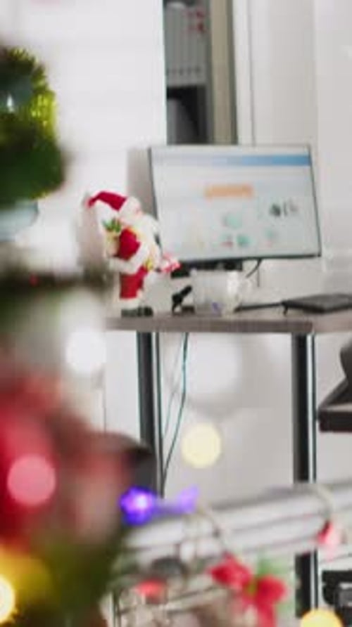 Vertical Video Worker Pleased By Xmas Gift in Office