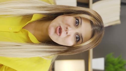 Young Adult Woman Talking Indoors