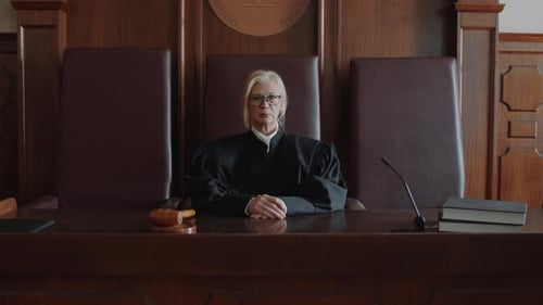 Female Judge Sits in Courtroom