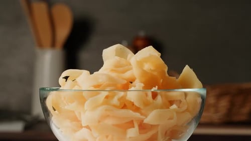 Close Up of Bowl Overflowing with Diced Fruits