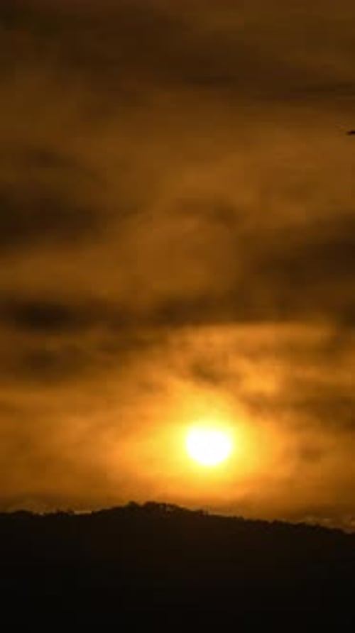 Golden Sunrise Time Lapse Over Mountain Silhouette