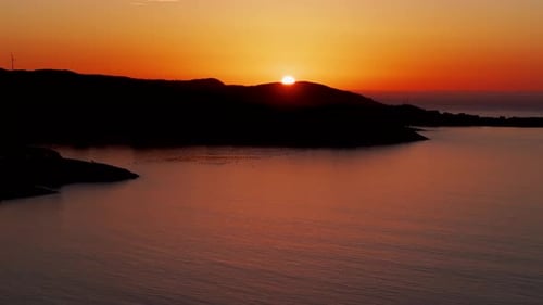 Golden Hour Sunset Over Ocean In Muxia, A Coruna, Spain. drone ascend