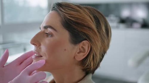 Woman Patient Consulted Cosmetologist Before Clinic Beauty Procedure Close Up