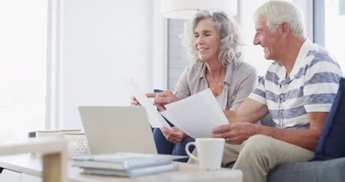 Senior couple, budget and documents for finance, asset management or pension investment plan