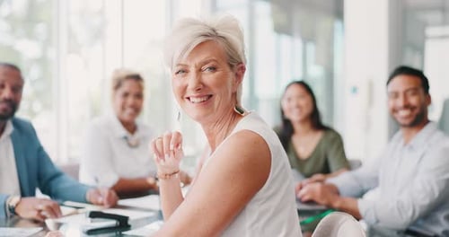Smiling Team in Modern Office Meeting