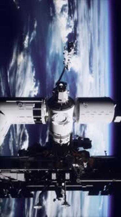 International Space Station Rotates Solar Panels In Outer Space Vertical